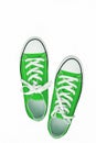 pair of sneakers-colored youth running shoes on a white background, isolated Royalty Free Stock Photo