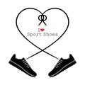 A pair of sneakers and a heart shaped shoelaces. A pair of gym shoes with long laces. I love sport shoes.