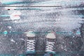 Pair of sneakers on pavement with digital glitch effect