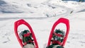 Pair of snowshoes on Man`s legs