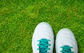 Pair Of Soccer Shoes On green grass field