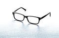 Pair of spectacles or eyeglasses on white