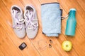 Pair of sport shoes and fitness accessories. Royalty Free Stock Photo