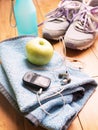 Pair of sport shoes and fitness accessories. Royalty Free Stock Photo