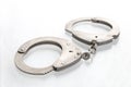 Pair of steel handcuffs close up, Royalty Free Stock Photo