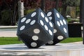 Pair of stone dice in a public park, Baku, Azerbaijan Royalty Free Stock Photo