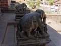 A pair of stone elephants greets visitors