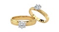 Two elegant gold diamond rings showcase exquisite craftsmanship and sparkling brilliance isolated on white background Royalty Free Stock Photo