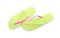 Pair of stylish green flip flops isolated, top view. Beach object Royalty Free Stock Photo