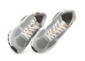 Pair of stylish grey sneakers isolated on white Royalty Free Stock Photo