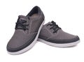 Pair of stylish grey sneakers on white background with clipping path. Royalty Free Stock Photo