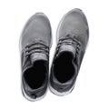 Pair of stylish grey sneakers on white background, top view Royalty Free Stock Photo