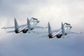 Pair of Sukhoi Su-30SM RF-91815 jet fighters take off at Kubinka air force base during Army-2015 forum. Royalty Free Stock Photo