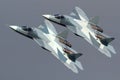 Pair of Sukhoi T-50 PAK-FA 052 BLUE and 051 BLUE modern russian jet fighters performing demonstration flight in Zhukovsky Royalty Free Stock Photo