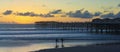 A Pair of Sunset Surfers at Crystal Pier, San Diego, CA Royalty Free Stock Photo