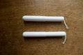 Pair of tampons with cardboard applicators