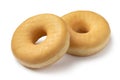 Pair of tasty sweet traditional donuts close up on white background