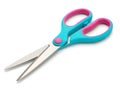 A pair of teal and pink handled scissors on a white background Royalty Free Stock Photo