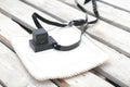 Pair of tefilin and Tallit A symbol of the Jewish people, a pair of tefillin with black straps, isolated on a white background, wi