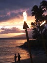A Pair of Tiki Torches on the Beach, Napili Bay, Maui, Hawaii Royalty Free Stock Photo