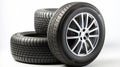 A pair of tires. Wheels of vehicles stacked up. lone automobile tires on a white background. Generative AI
