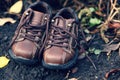 Pair of toddler boots lying on the ground