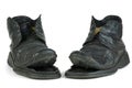 Pair of torn old boots Royalty Free Stock Photo