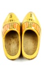 Pair of traditional Dutch yellow wooden shoes Royalty Free Stock Photo