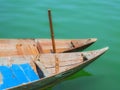 Pair of traditional Vietnamese sampan rowboats on water