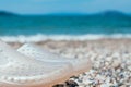 Water shoes on beach. Holiday concept