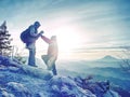 Pair of travelers on peak trail. Two photographers, a man and woman Royalty Free Stock Photo