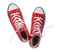 Pair of trendy sneakers on white, top view Royalty Free Stock Photo