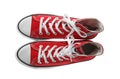 Pair of trendy sneakers on white, top view Royalty Free Stock Photo