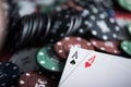 A pair of two aces with poker chips Royalty Free Stock Photo