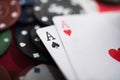 A pair of two aces with poker chips Royalty Free Stock Photo