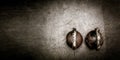 Pair of two old heavy iron kettlebells on the gym floor ready for strength and conditioning workout Royalty Free Stock Photo