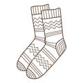 A pair of warm patterned socks. Autumn and winter clothing. Design element with outline. The theme of winter, autumn. Doodle, hand