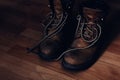 Pair of warn out boots with shoelaces Royalty Free Stock Photo