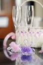 A pair of wedding glasses and a basket