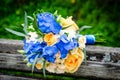 Pair of wedding rings on the background of the bridal bouquet Royalty Free Stock Photo