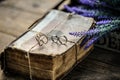 A pair of wedding rings on a old antique vintage book