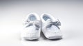 A pair of white baby girl shoes isolated on white background Royalty Free Stock Photo