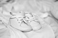 Pair of white baby shoes