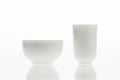 Pair of white cups on a white background