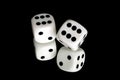 Pair of white dice on black reflective background Royalty Free Stock Photo