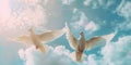 A pair of white doves soaring through a clear blue sky, symbolizing peace and love Royalty Free Stock Photo