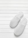Pair of white hotel / home/ spa / wellness slippers Royalty Free Stock Photo