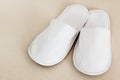Pair of White hotel / home/ spa / wellness slippers Royalty Free Stock Photo