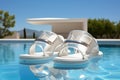 A pair of white sandals sitting on top of a pool. AI.