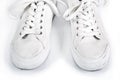 Pair of white sneakers with laces Royalty Free Stock Photo